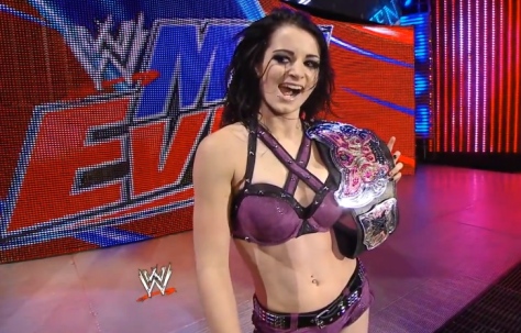 Paige celebrates a victory over Alicia Fox at the April 29 Main Event ...