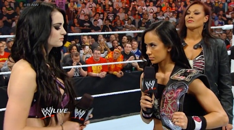 AJ Lee confronts Paige before their WWE Divas Championship match at RAW on April 7. Paige won the match, and AJ hasn't been in the ring since.