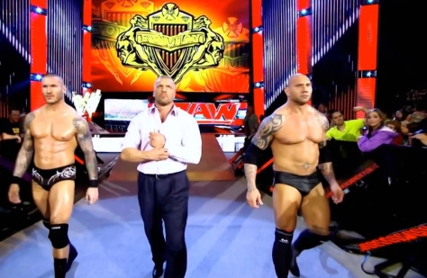 Evolution — Randy Orton, Triple H and Batista — make their way ringside at RAW on April 28.